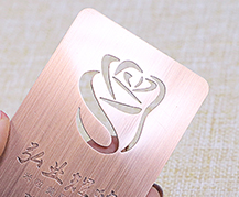 metal card with die cut logo