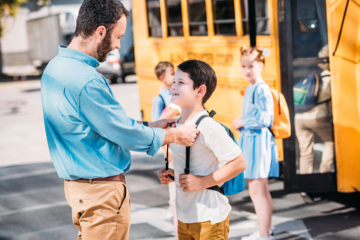 Parents use smart pick up card to pick up students